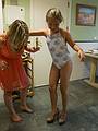 Natalia and Paula trying on Natalia's high heel shoes.<br />July 8, 2013 - At Salvador and Asuncion's in Madrid, Spain.