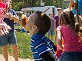 Matthew at donut eating contest.<br />Merrimac Old Home Days.<br />August 10, 2013 - Athletic field in front of Donahue School, Merrimac, Massachusetts.