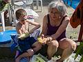 Matthew and Joyce shucking corn.<br />August 11, 2013 - At Marie's in Lawrence, Massachusetts.