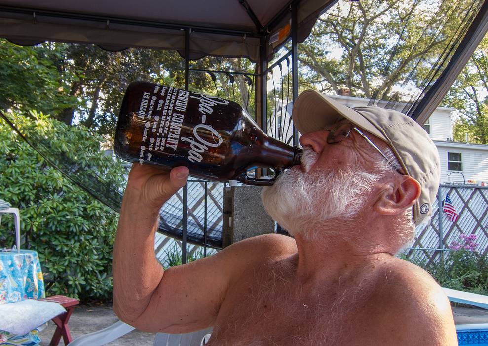 Egils, known as opa to the grandkids, chugging some Opa-Opa beer.<br />August 11, 2013 - At Marie's in Lawrence, Massachusetts.