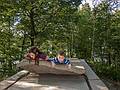 Miranda and Matthew on the magic carpet of<br />Carlos Dorrien: 'Little Red Riding Hood and Other Stories', granite.<br />August 24, 2013 - DeCordova Museum, Lincoln, Massachusetts.