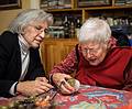 Joyce and her mother Marie looking at bug food from Thailand.<br />Nov. 23 - At Paul and Norma's in Tewksbury, Massachusetts.