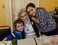 Matthew and Miranda glued to Joyce.<br />Nov. 28, 2013 - Thanksgiving at Paul and Norma's in Tewksbury, Massachusetts.