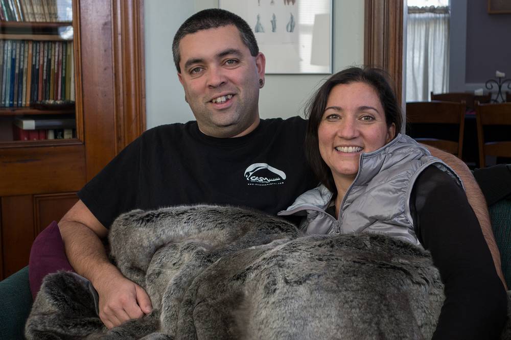 Sati and Melody covered in one of their Christmas presents.<br />Dec. 25, 2013 - Merrimac, Massachusetts.