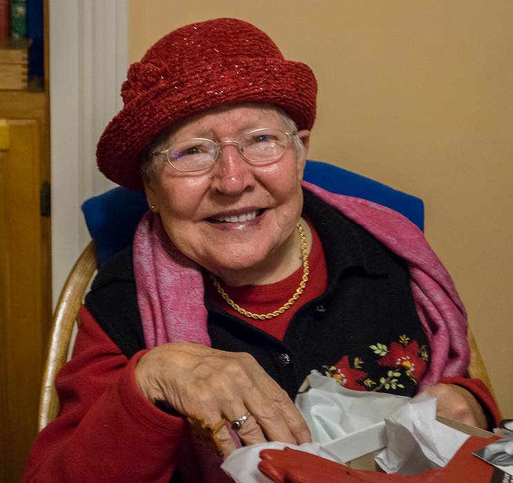 Marie in a red hat (a Chirstmas present).<br />Dec. 25, 2013 - Christmas at Paul and Norma's in Tewksbury, Massachusetts.