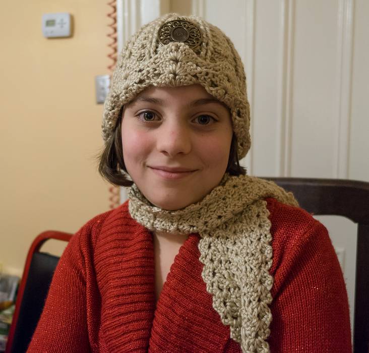 Miranda with new hat and scarf.<br />Dec. 25, 2013 - Christmas at Paul and Norma's in Tewksbury, Massachusetts.