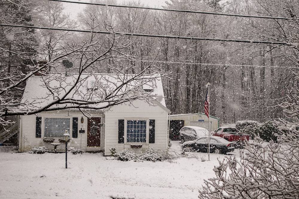 It's snowing (house across the street).<br />Jan. 18, 2014 - Merrimac, Massachusetts.