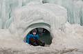 Matthew emerging from the tunnel slide.<br />Ice Castle at Loon Mountain.<br />Feb. 22, 2014 - Lincoln, New Hampshire.