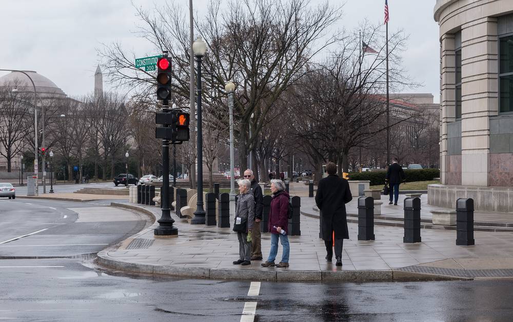 Baiba, Ronnie, and Joyce waiting for a traffic light.<br />March 28, 2014 - Washington, DC.