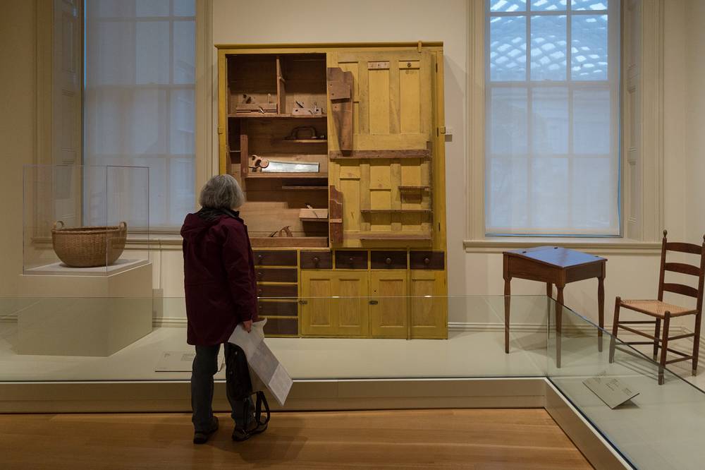 Joyce looking at cupboard and tools, about 1840, 1850.<br />March 28, 2014 - National Portrait Gallery, Washington, DC.