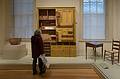 Joyce looking at cupboard and tools, about 1840, 1850.<br />March 28, 2014 - National Portrait Gallery, Washington, DC.