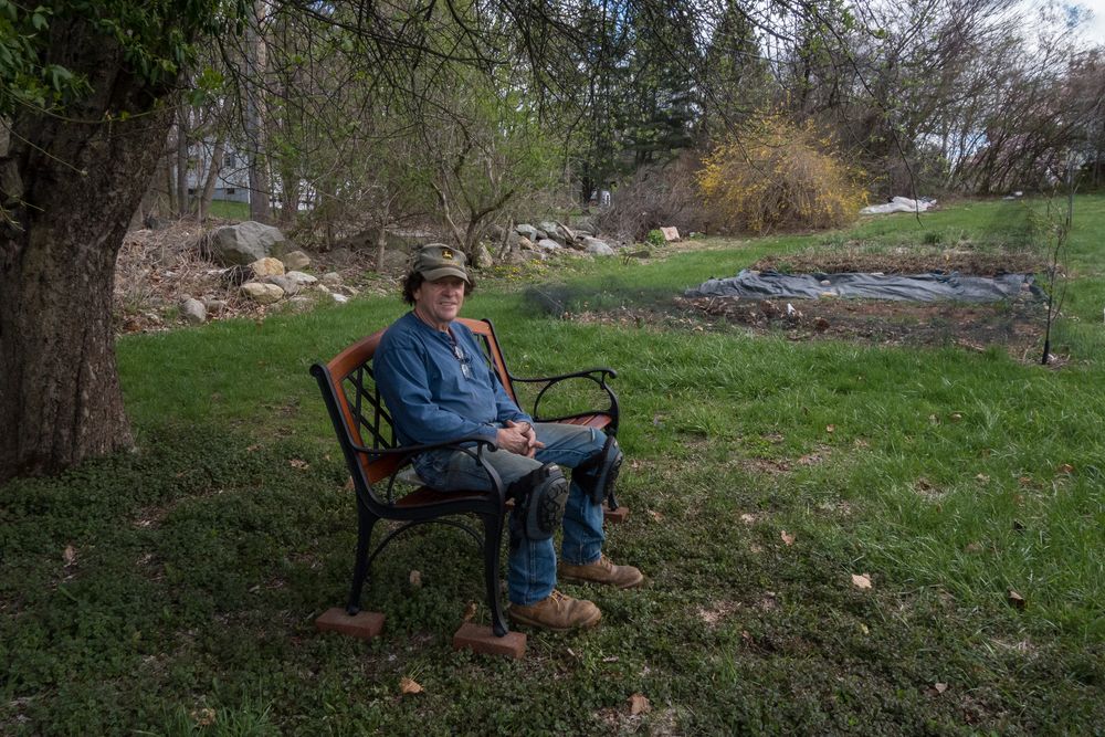 Farmer Paul resting on his birthday present from us.<br />May 5, 2014 - At Paul and Norma's in Tewksbury, Massachusetts.