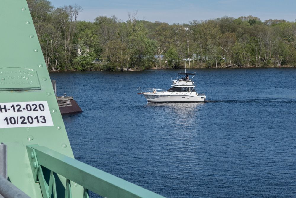 Traffic was stopped to let this boat go through the opened bridge.<br />May 17, 2014 - Rocks Village, Haverhill, Massachusetts.