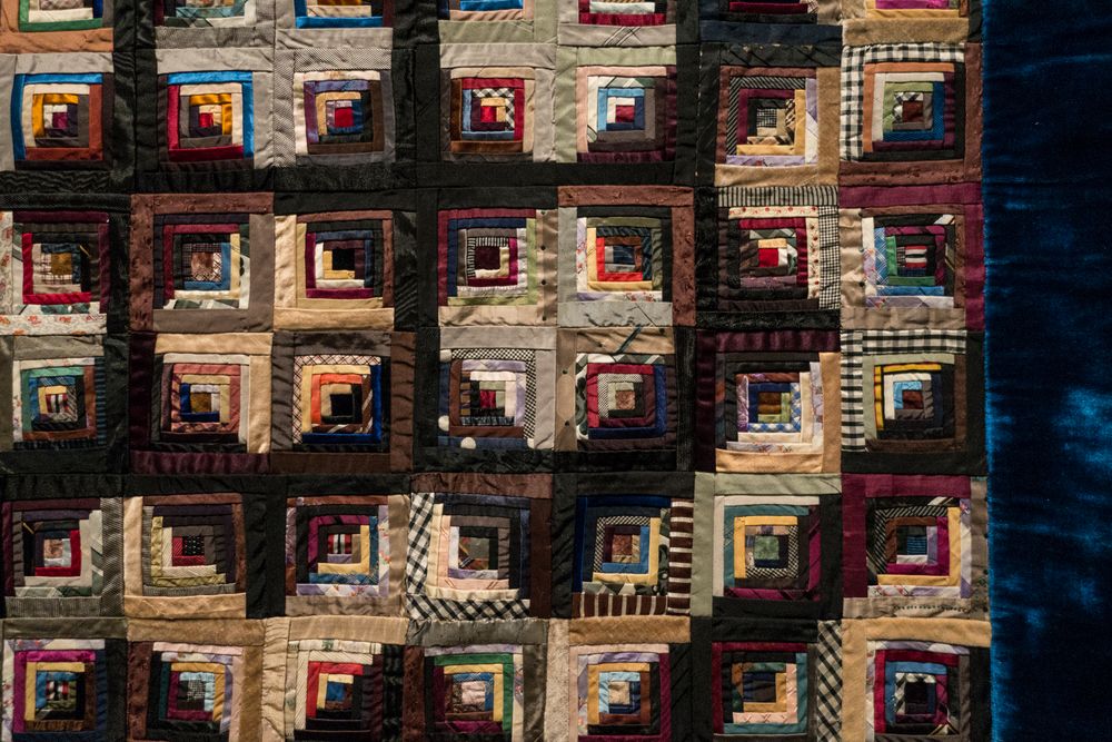 Detail of the Log Cabin, Sunshine and Shadow variation quilt.<br />'Quilts and Color', the Pilgrim/Roy Collection show.<br />May 18, 2014 - Museum of Fine Arts, Boston, Massachusetts.