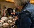 Dinner at Bonnie's with Joyce, Tom, and myself.<br />Joyce preparing the dessert just before serving it.<br />May 24, 2014 - Newburyport, Massachusetts.