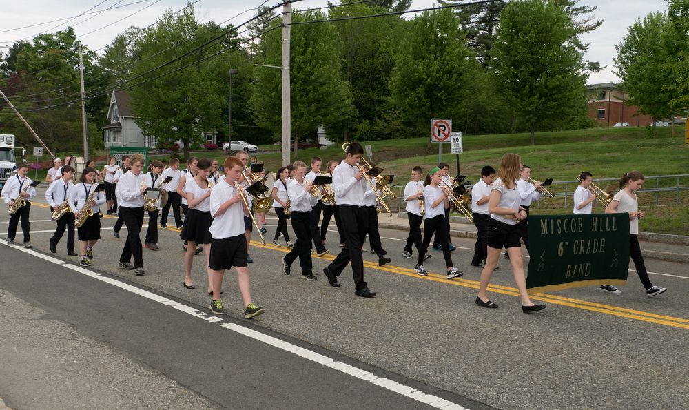 Miranda playing the saxophone in her school's band in the Memorial Day Parade.<br />Upton, Massachusetts.