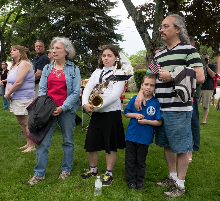 Joyce, Miranda, Matthew and Carl watching the Memorial Day ceremonies.<br />Upton, MA.