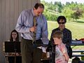 State senator Jamie Eldridge presenting Calvin Miller with an award for naming the sculpture.<br />June 1, 2014 - Nara Park, Acton, Massachusetts.