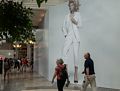 Joyce and Tom striding in the Prudential Center mall.<br />June 8, 2014 - Boston, Massachusetts.