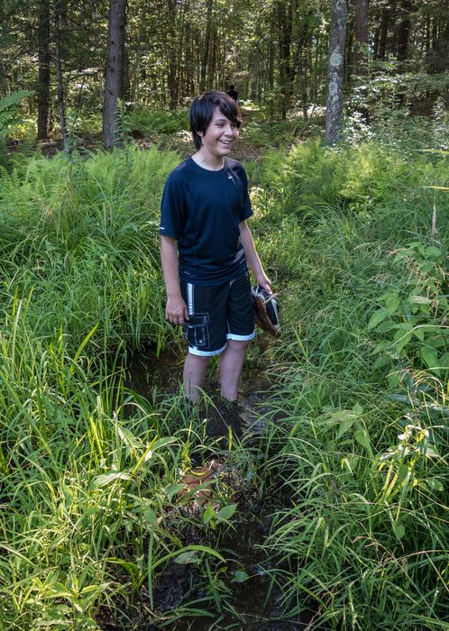 Gujn ankle deep in mud.<br />July 10, 2014 - Merrimac, Massachusetts.