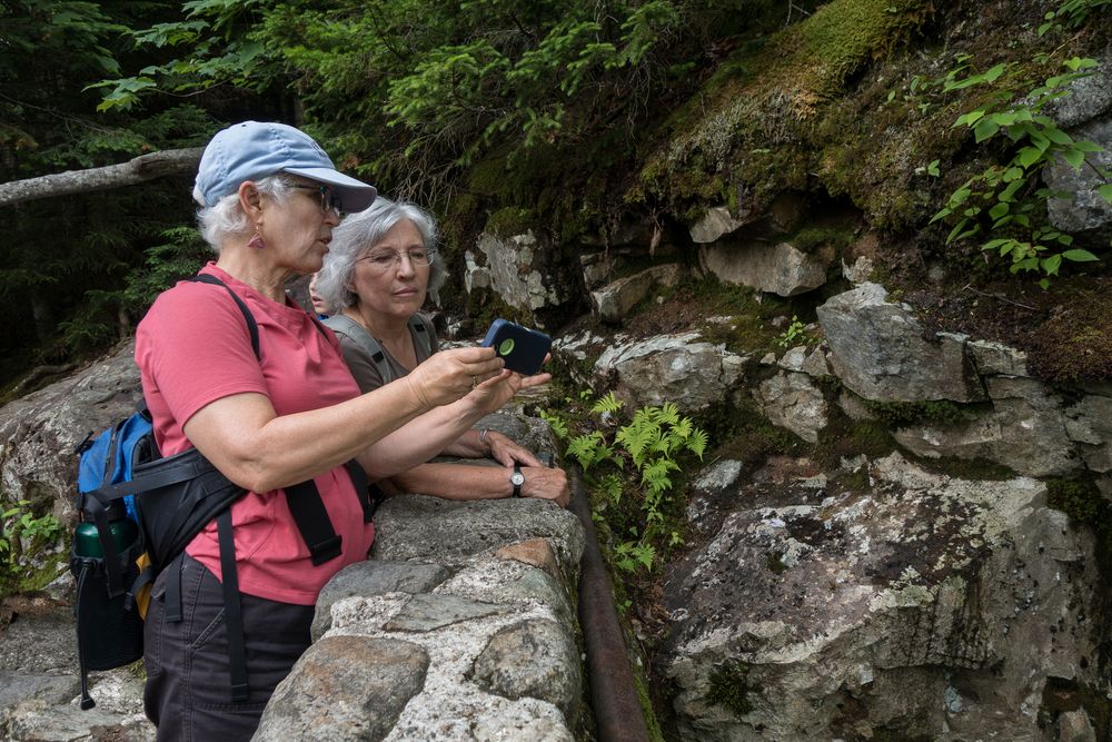 Deb and Joyce chimping at the Crystal Cascades off Tuckerman Ravine Trail.<br />July 25, 2014 - Pinkham Notch, New Hampshire.