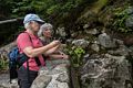 Deb and Joyce chimping at the Crystal Cascades off Tuckerman Ravine Trail.<br />July 25, 2014 - Pinkham Notch, New Hampshire.