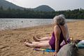 Joyce (and Deb behind her).<br />Cathedral Ledge in the middle background.<br />July 25, 2014 - Echo Lake, Conway, New Hampshire.