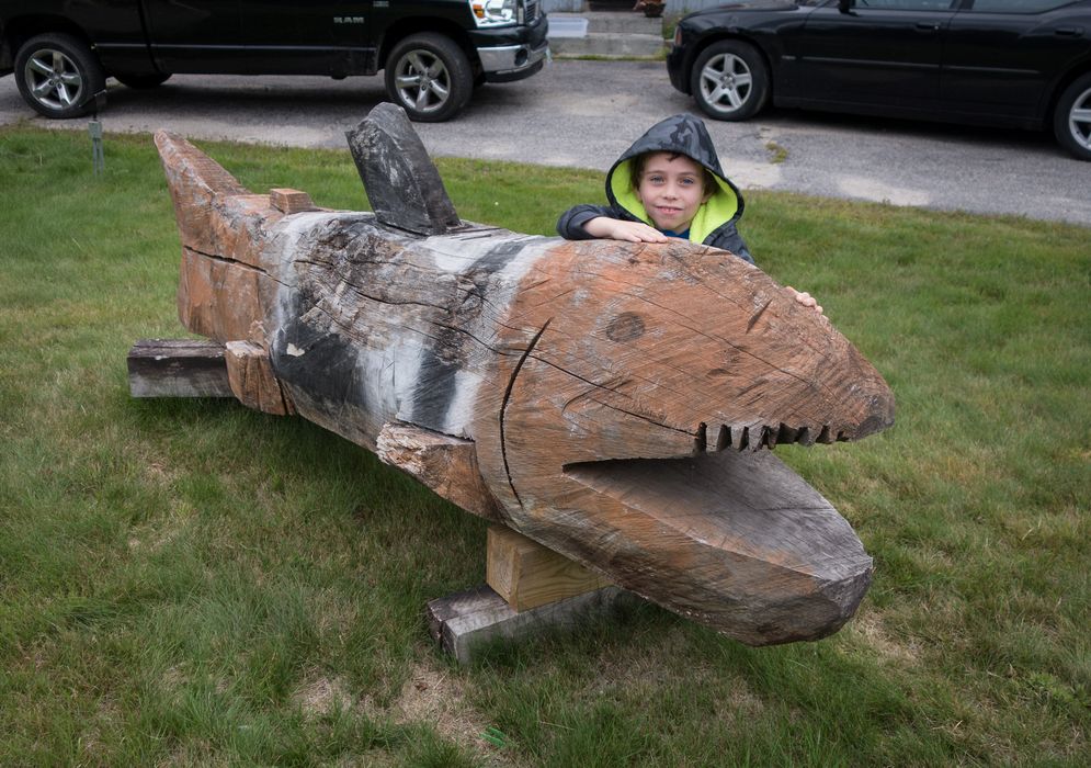 Matthew and shark in front of Northern Embers Restaurant.<br />Aug. 21, 2014 - Twin Mountain, New Hampshire.