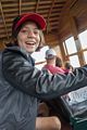 Miranda standing vertical yet at an angle to the car.<br />Aug. 22, 2014 - Cog Railway, Mount Washington, New Hampshire