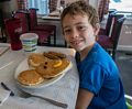 Matthew at breakfast at Munroe's Family Restaurant.<br />Aug. 23, 2014 - Twin Mountain, New Hapshire.