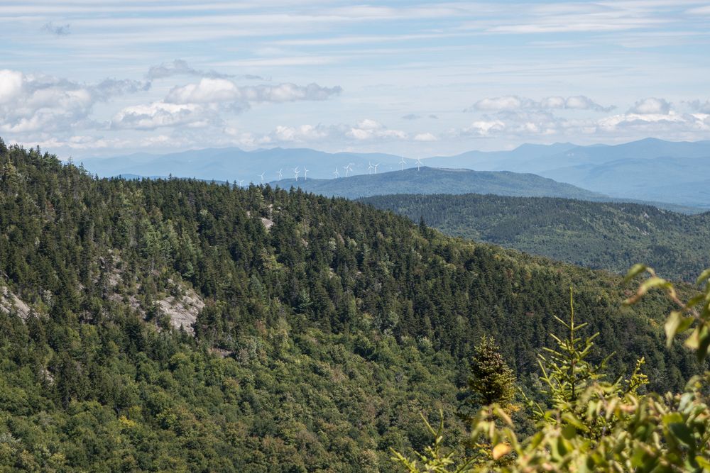 View from PJ Ledge off Clark Trail.<br />Note wind turbines along third ridge.<br />Aug. 30, 2014 - Mt. Cardigan, New Hamphire.
