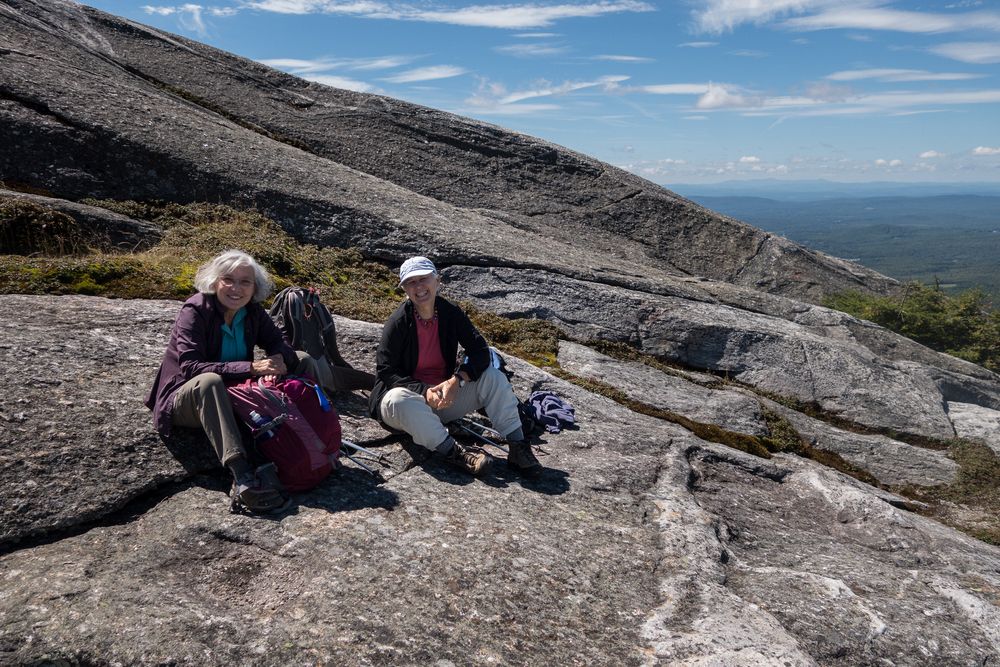 Joyce and Deb at lunch below top and out of the wind.<br />Aug. 30, 2014 - Mt. Cardigan, New Hamphire.