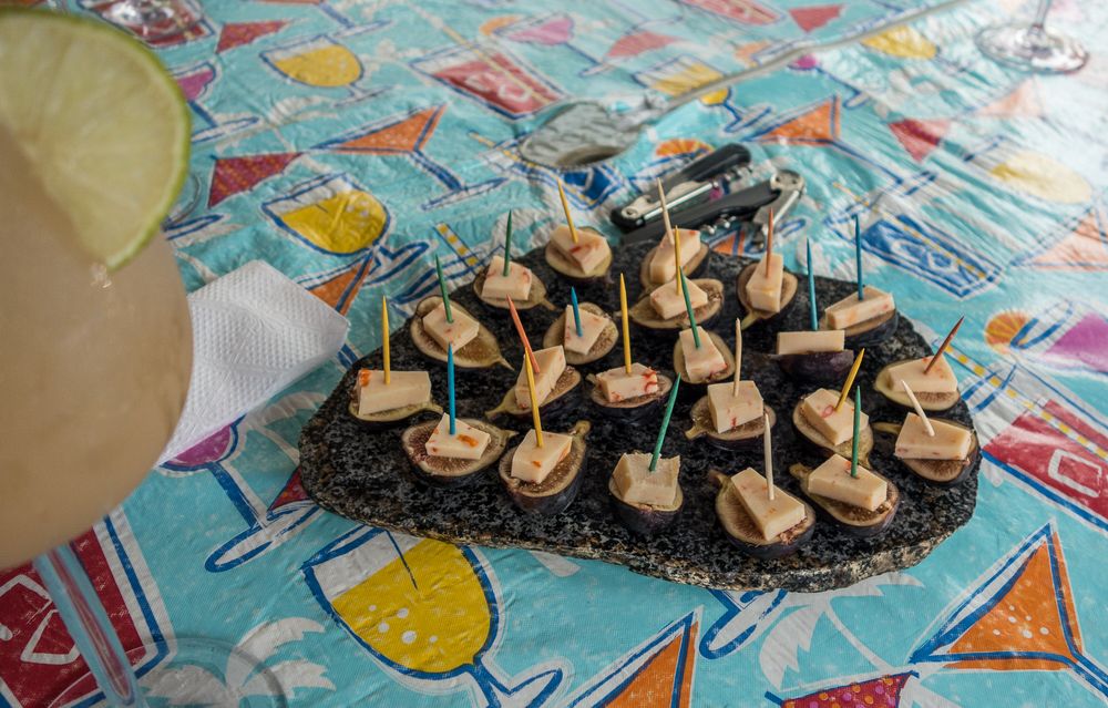 Appetizer: cheese on fresh figs on granite plate.<br />Sept. 5, 2014 - At Marie's in Lawrence, Massachusetts.