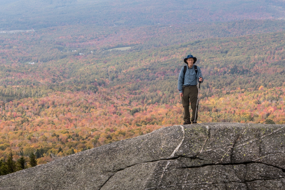 Bob innersed in fall foliage.<br />Hike via West Ridge Trail.<br />Oct. 2, 2014 - Mt. Cardigan, New Hampshire.