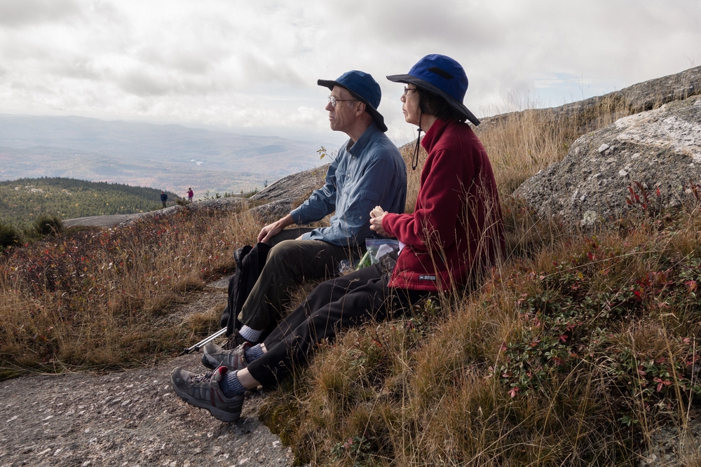 Bob and Yoong admiring the scenery while at lunch.<br />Hike via West Ridge Trail.<br />Oct. 2, 2014 - Mt. Cardigan, New Hampshire.