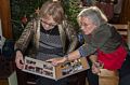 Linda and Joyce explaining something about the book she put together about her (and Linda's) ancestors.<br />Dec. 25, 2014 - At home in Merrimac, Massachusetts.