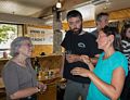 Joyce and Sati listen to Melody's stories while doing some beer tasting.<br />Aug. 1, 2014 - Mammoth Brewing Company, Mammoth Lakes, California.