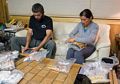 Sati and Melody packing food into bear-proof containers for the next leg of their trek.<br />Aug. 1, 2014 - White Horse Inn, Mammoth Lakes, California.