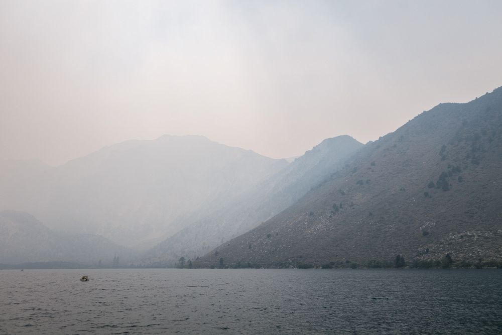 The smoke from the "French" fire moved in as we completed our hike.<br />Aug. 2, 2014 - Convict Lake, California.