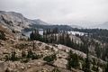 May Lake from trail up Mt. Hoffmann with smoke in the background.<br />Aug. 3, 2014 - Yosemite National Park, California.