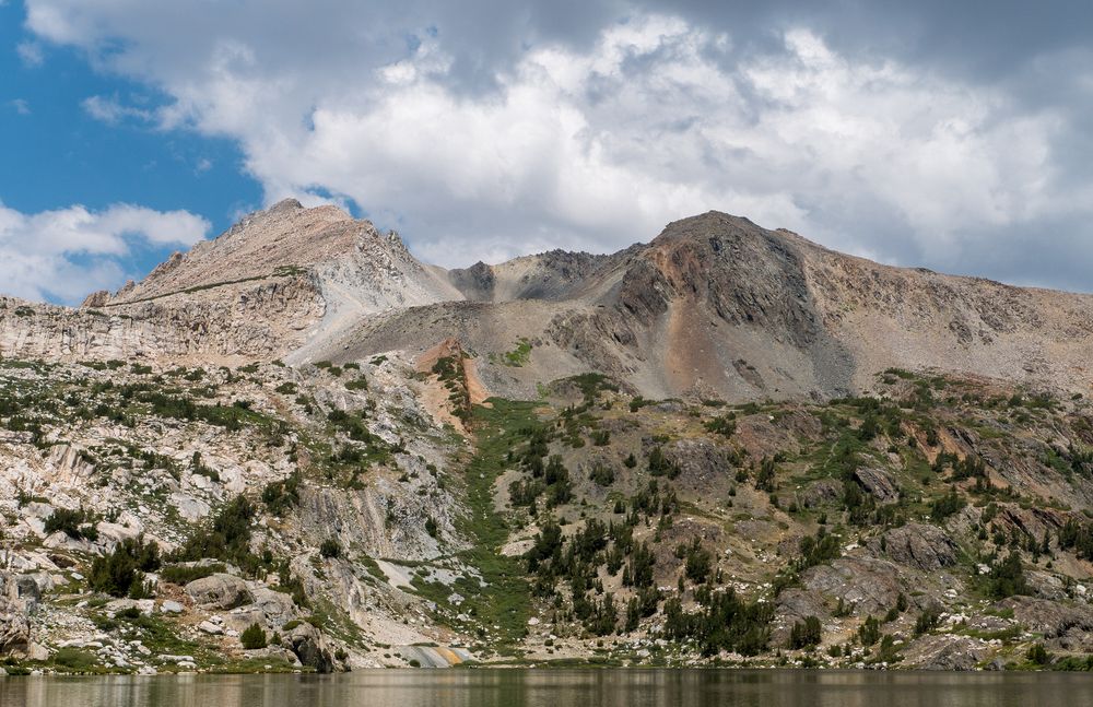 Colorful mountain beyond the lake.<br />Aug. 9, 2014 - Steelhead Lake. Inyo National Forest, California.