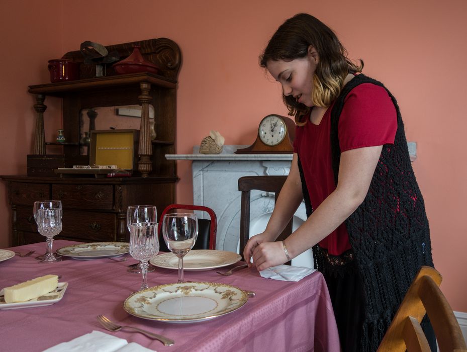 Miranda folding napkins.<br />Easter dinner.<br />April 5, 2015 - At Paul and Norma's in Tewksbury, Massachusetts.