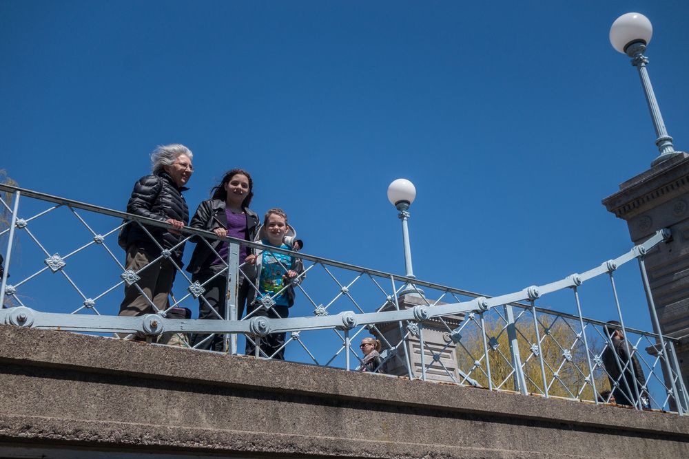 Joyce, Miranda, and Matthew on bridge over the Lagoon.<br />April 19, 2015 - Public Garden, Boston, Massachusetts.