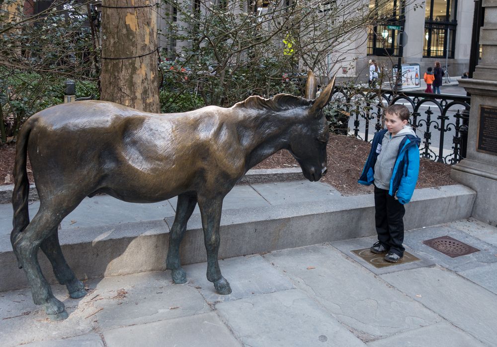 Matthew in republican footsteps opposing a democratic donkey at the Old City Hall.<br />April 19, 2015 - Boston, Massachusetts.