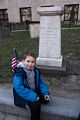 Matthew and the Paul Revere monument at the Granary Burying Ground.<br />April 19, 2015 - Boston, Massachusetts.