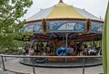 Carousel with figures fabricated by artist Jeff Briggs of Newburyport.<br />June 16, 2015 - Along the Greenway in Boston, Massachusetts.
