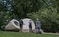 Joyce, Baiba, and Ronnie examining Isamu Noguchi's " Momo Taro".<br />June 17, 2015 - Storm King Arts Center, Mountainville, New York.