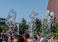 Frozen water.<br />Matthew (in orange shirt) at the Rings Fountain.<br />July 3, 2015 - Along the Greenway in Boston, Massachusetts.