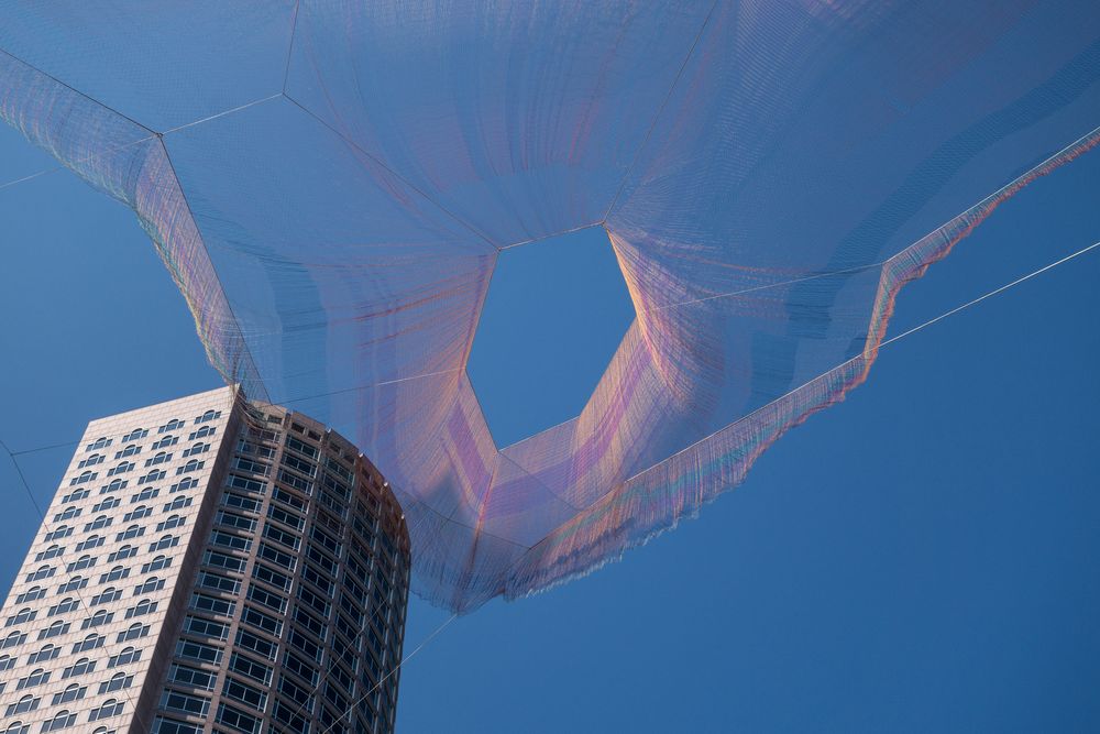 Janet Echelman's "As If It Were Already Here".<br />July 3, 2015 - Along the Greenway in Boston, Massachusetts.