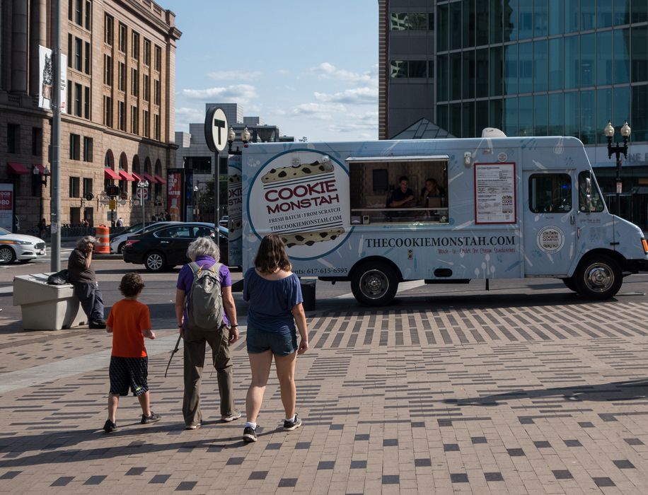 Matthew, Joyce, and Miranda attracted to cookies.<br />July 3, 2015 - Along the Greenway in Boston, Massachusetts.